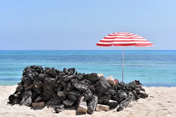 Gordijnen Colorful sun umbrella in Corralejo beach, Fuerteventura Island, Canary Islands, Spain © akturer