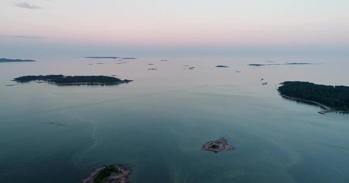 Panning over the archipelago outside Helsinki Finland on an sunset evening