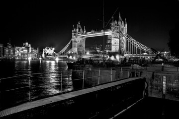 Fototapeta na wymiar River Thames and Tower Bridge at Night Black and White