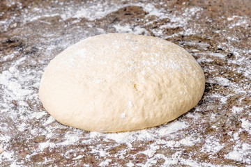 Fototapeta na wymiar dough on a marble table