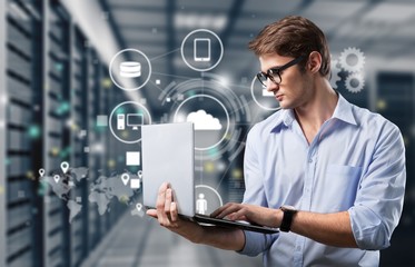 Young business man using laptop