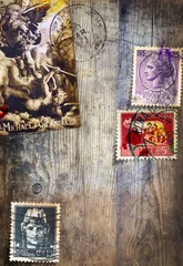 Foto op Plexiglas Ouderwetse antieke houten achtergrond met oude Italiaanse postzegels en oude religieuze afbeelding van Aartsengel Michael © Rosario Rizzo