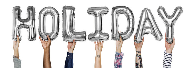 Hands showing holiday balloons word