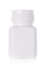 White plastic medicine bottle isolated on white