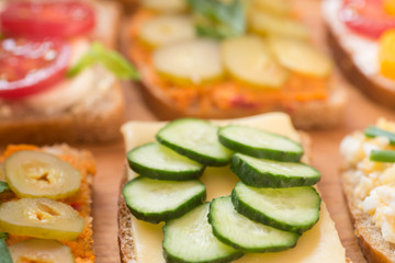 healthy sandwiches on wooden table macro