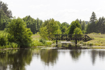 Fototapeta na wymiar summer landscape with bridge