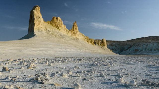 Sunny morning in the magnificent white chalky canyon of Kasakhstan. 4K slider shot of the marvelous moon looking landscape.