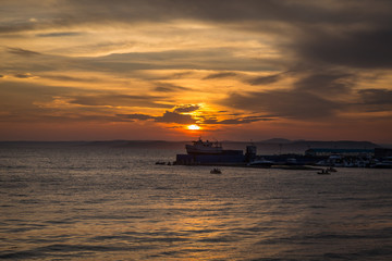 Sunset view of the yachts standing in harbour