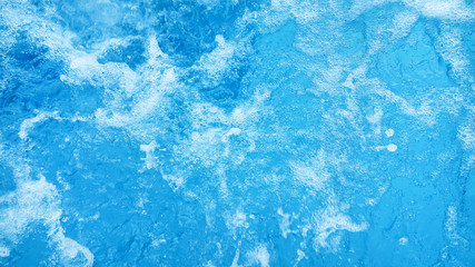 Fototapeta na wymiar Blue water wavy background