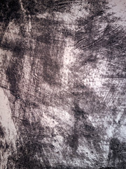 Close-up  of cracked paint on  metal wall