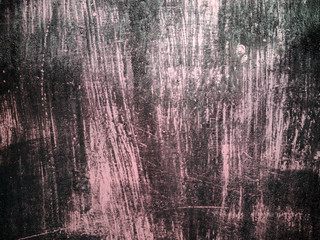 Close-up  of cracked paint on  metal wall