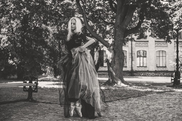 Halloween concept, lady in witch costume, Portrait of a woman in vintage gothic dress, celebration...