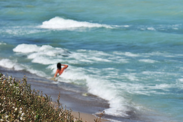 Relax on Vama Veche  beach,a non-mainstream tourist destination on the Black Sea coast, near the border with Bulgaria,popular destination for tourists from entire world. Blur image.