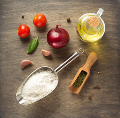 food ingredients and spices at wooden table