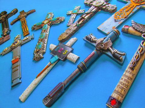 Decorative cross, crucifix - bikers souvenirs. Traditional decorative art, design element of bikers culture, accessories of modern wall decoration.