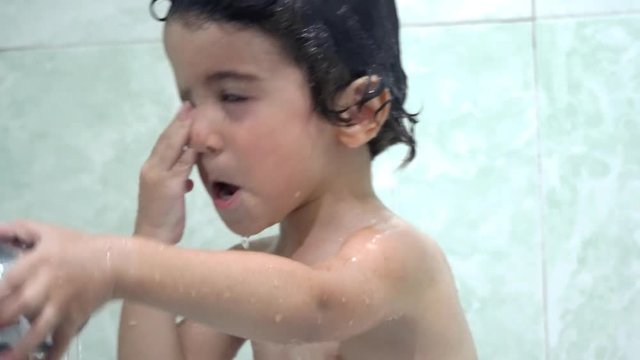 Little boy who doesn't want to take a bath. 4K