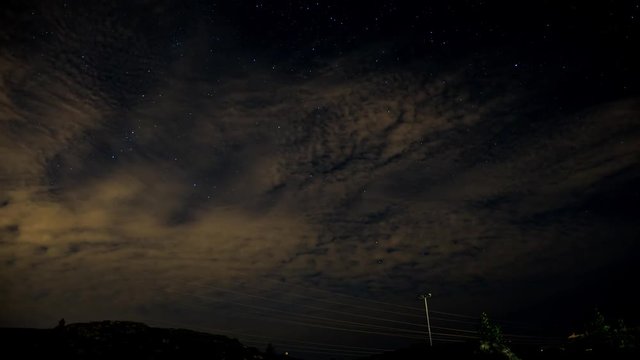 A timelapse with a night skyes and stars