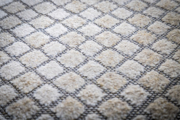 Fototapeta premium Gray fabric texture in a cage. Close up picture