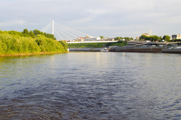 The suspension bridge and Tura River Embankment in Tyumen, Russia.