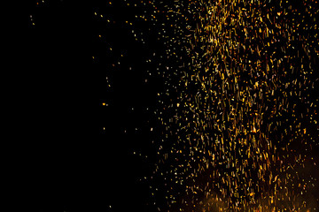 bonfire spark in the dark sky in night, shallow focus