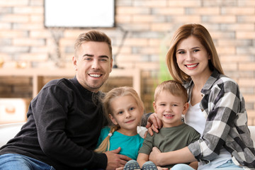 Obraz premium Portrait of happy family with little children at home