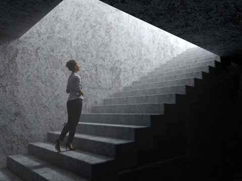 woman climbs the stairs from darkness to light