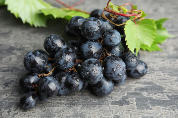 Fresh ripe juicy grapes on table. Wine ingredient