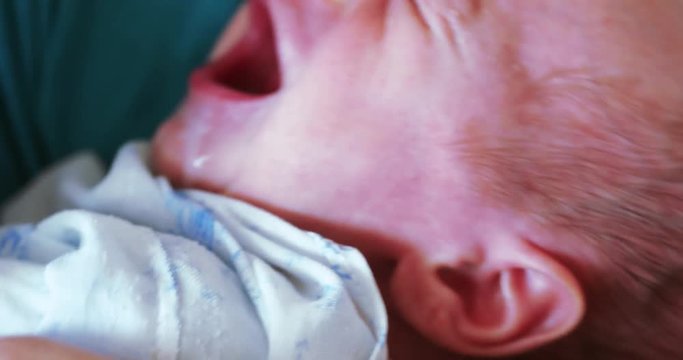 Artificial feeding of the child with a syringe