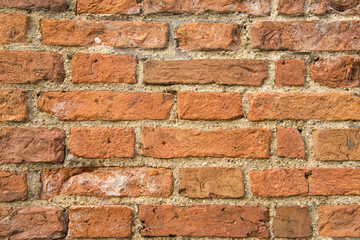 Orange red old brick wall
