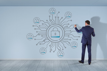 Businessman drawing thin line web security interface on the wall
