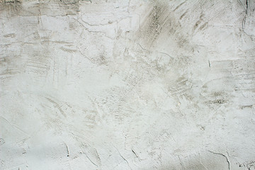 white and gray textured plaster on the wall