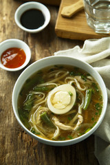 Asian style soup with noodles and egg