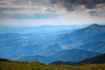 Fototapeta na wymiar mountain view with green firs, Tibles, Romania
