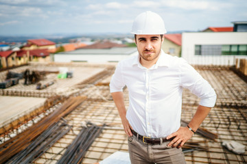 portrait of construction industry business man, apartment buildings developer