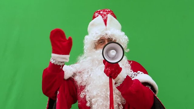 Father Frost holds the form. The New Year's character holds the A4 format model. Green background. An opportunity to insert the design.
