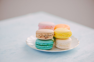 Delicious french dessert. Colorful pastel cake macaron or macaroon