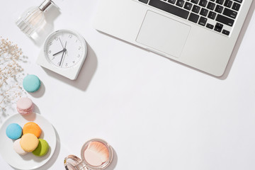 Cozy morning breakfast with pastel colorful macarons or macaroons.