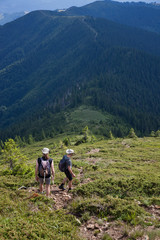 Fototapeta na wymiar male hiker trekking in the mountains