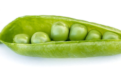 Pod with fresh green peas.