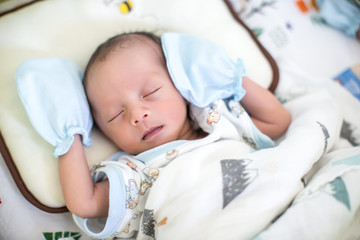 Baby boy sleeping on the bed. growth hormone and sleep in infant. cute baby boy asleep. beauty and fashion of baby.  image for background, wallpaper, copy space, illustration and advertisement.