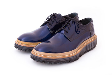 Pair of blue glossy men's shoes isolated on white background