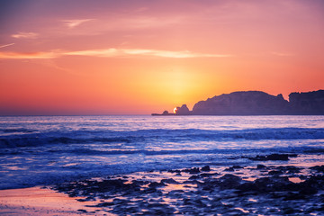 Obraz premium beautiful stunning magical ocean landscape, coast of Portugal, the Algarve at sunset,