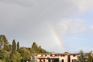 Arcobaleno sopra case Osimo,Italy