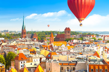 Aerial panoramic view of historical buildings and roofs in Polish medieval town Torun © proslgn