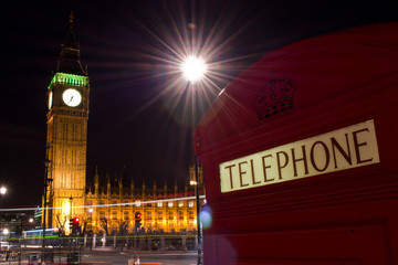 Obraz premium Cabina telefonica rossa e Big Ben di notte, Londra, Regno Unito