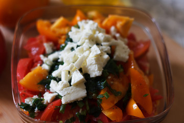 Cut ingredients for summer cheese salad