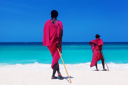 Two Maasai Warriors Looking On Ocean.