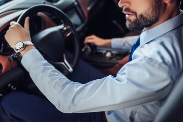 businessman driving car