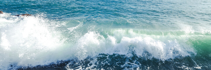 Fototapeta na wymiar Wave on ocean, banner, sea wave close up photography. Macro photo of ocean foam