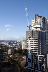 Fototapeta na wymiar Sydney Australia, construction of new highrise apartment building with views of Hyde Park and Harbour